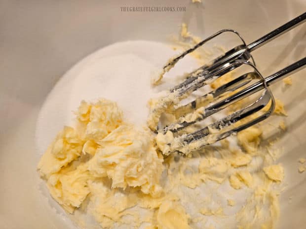 Soft butter and granulated sugar are beaten together until creamy.