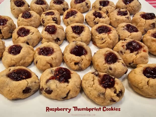 Make Raspberry Thumbprint Cookies for the holidays or any time! These bite-size treats, with chocolate chips and raspberry jam are wonderful!