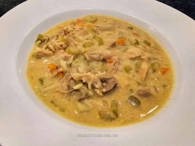 A big bowl of hot turkey mulligatawny soup is served.