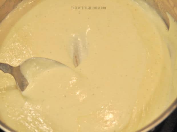 A pan full of creamy sauce for the Easy Fettucine Alfredo.