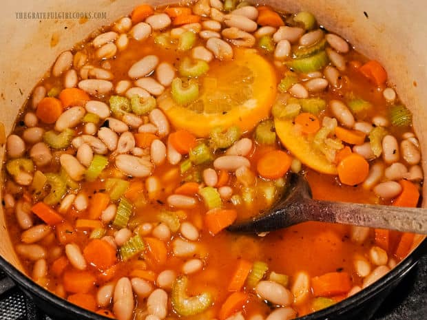 The Greek Cannellini Bean Stew cooks 30 minutes, or until thickened.