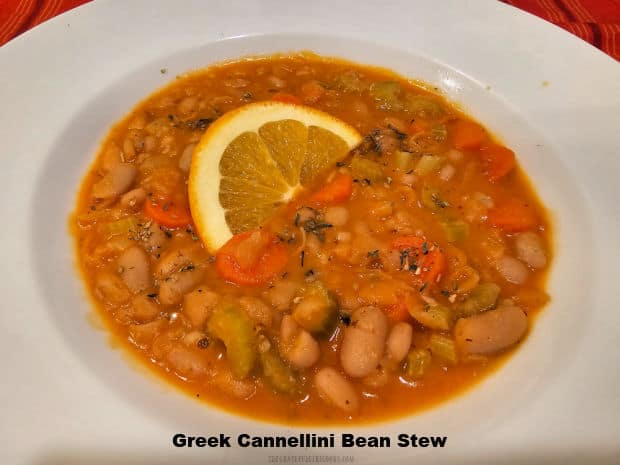 Greek Cannellini Bean Stew is an easy to make, meatless hearty stew with carrots, onion, garlic, celery and a hint of orange! It's DELICIOUS!