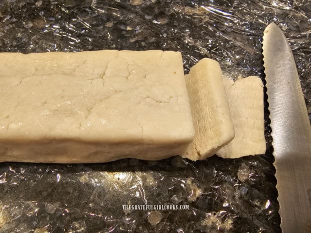 A serrated knife is used to slice the peppermint patty filling into 32 pieces.