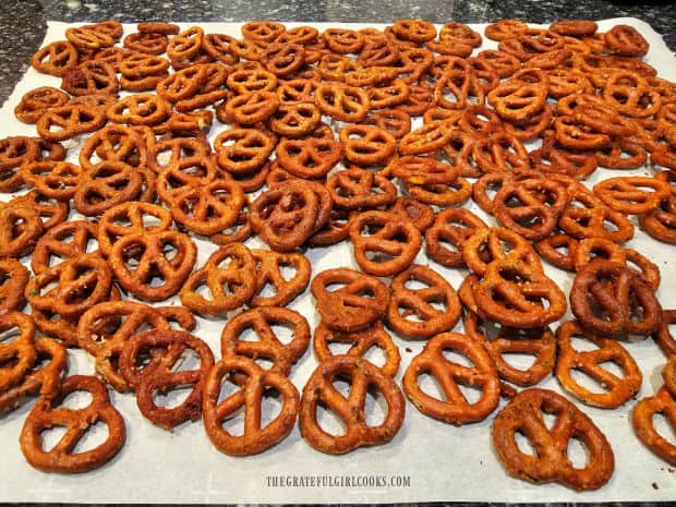 Ranch pretzel bites, cooling on parchment paper after baking for 1 hour.