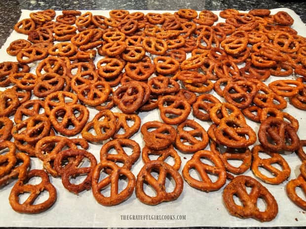 Ranch pretzel bites, cooling on parchment paper after baking for 1 hour.