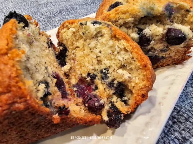 Cutting into the loaves reveals the juicy blueberries inside.