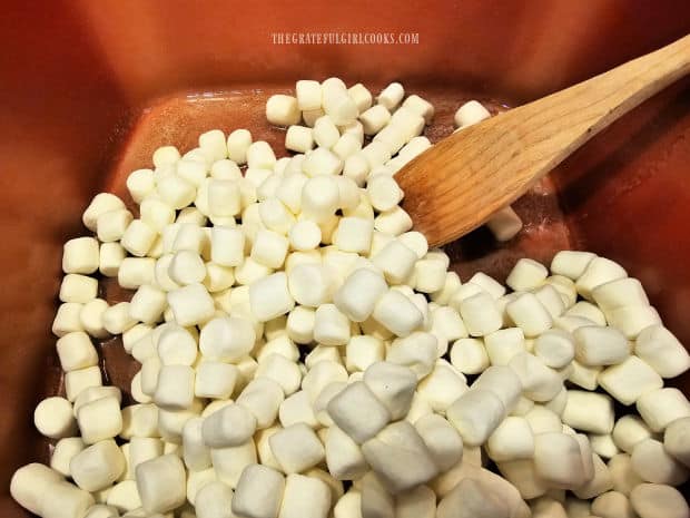 Miniature marshmallows are added to the melted butter.