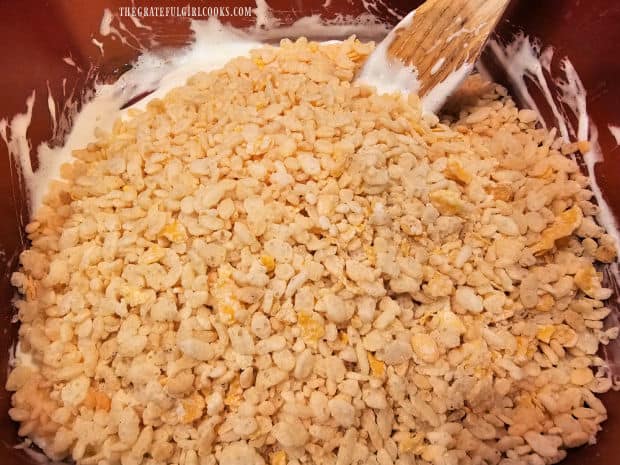 Stir crispy rice cereal into the marshmallow/butter mixture until combined.