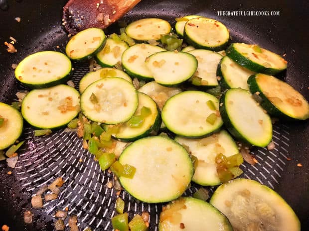 When the zucchini becomes crisp-tender, they are done cooking.