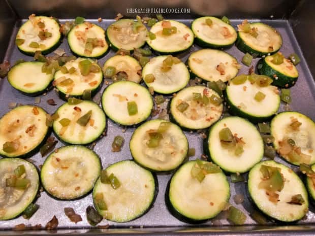 The zucchini mixture is placed in baking dish, in a single layer.