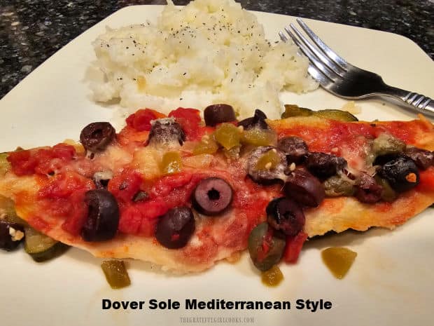 Dover Sole Mediterranean Style is a delicious dish with fillets baked on zucchini, and topped with tomatoes, capers, olives and Parmesan.