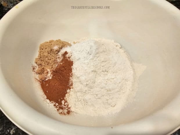 Flour, brown sugar, baking powder, cinnamon and salt in a mixing bowl.