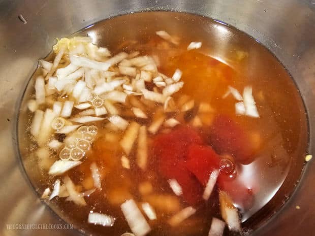 Ingredients for the savory sauce are placed in a small bowl.