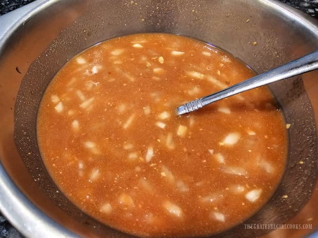 A savory sauce is made by combining ingredients in a bowl.