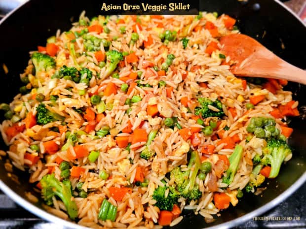 Asian Orzo Veggie Skillet is a dish with orzo, carrots, broccoli, peas, onions and eggs in a soy/ginger sauce - a yummy twist on fried rice!