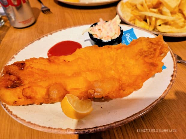A piece of beer-battered fish I had in Scotland (chips/fries on the side).