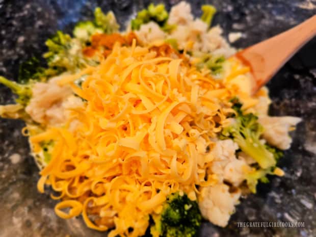 All ingredients for the vegetable casserole placed in a large mixing bowl.