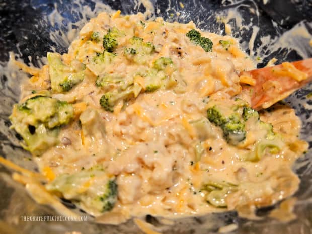 Ingredients for the cauliflower broccoli casserole are combined for baking.