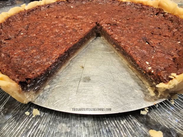  After slices are removed, the inside of the chocolate chess tart is revealed.