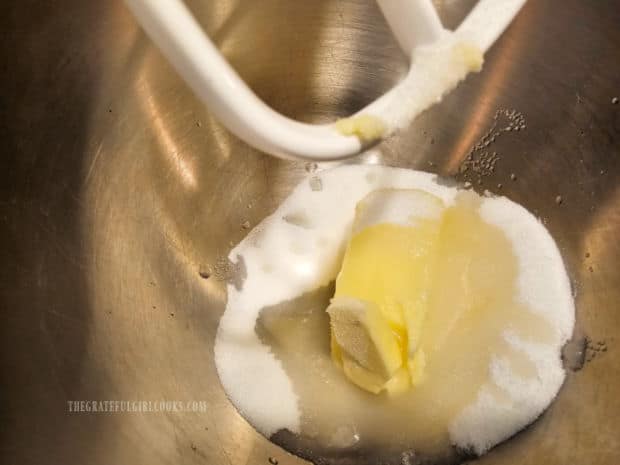 Butter, sugar and lemon juice are beaten with a mixer until combined.