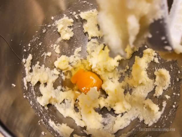 Eggs are added, one at a time, and mixed into the bread batter.