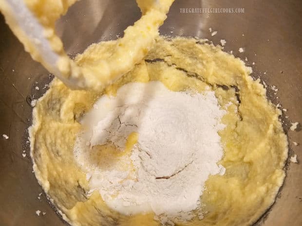 The dry ingredients and milk are added to the batter, a little at a time.