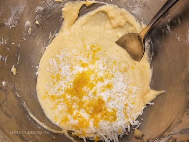 Lemon zest and shredded coconut are stirred into the bread batter.