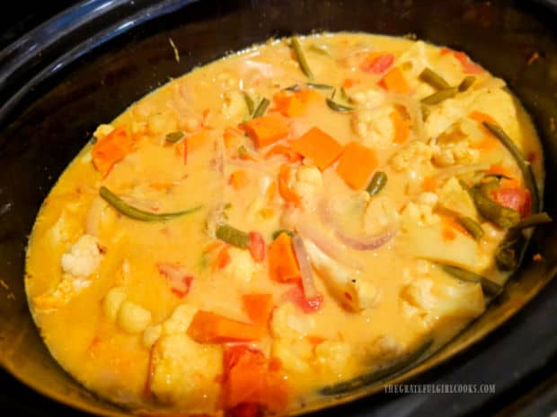 The slow cooker veggie curry is colorful when the dish is finished cooking.