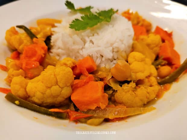 A filling meal of slow cooker veggie curry, with white steamed rice.