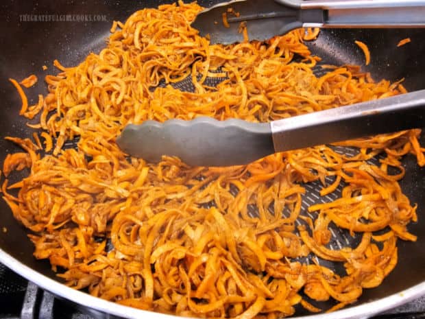 Sweet potato noodles are tossed with browned butter and sage until combined.