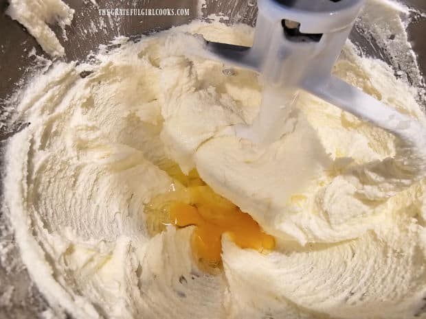 Eggs are beaten into the cookie batter, one at a time.