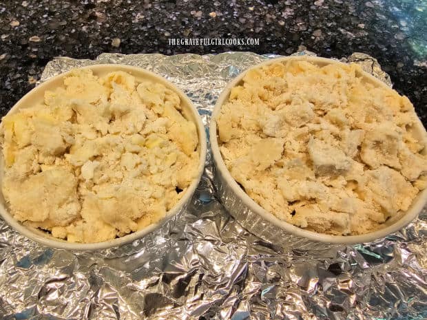 Strawberry Rhubarb Cobbler For Two in ramekins on foil, before baking.