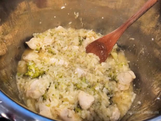 After cooking, the casserole is given a quick stir in the Instant Pot.