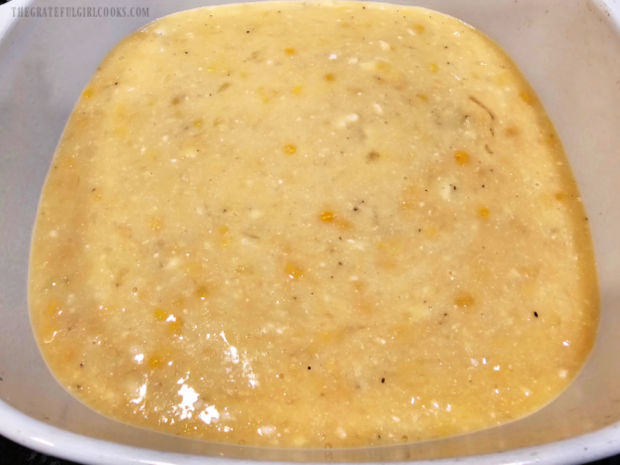 Batter is poured into a baking dish and is ready for the oven.