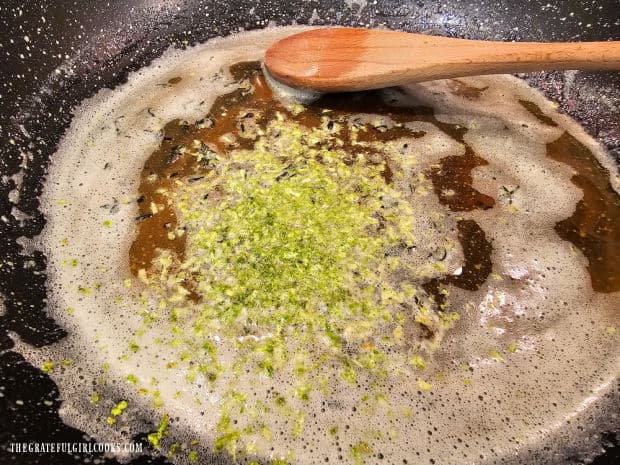 Once butter is browned, thyme leaves and fresh lime zest are stirred in.