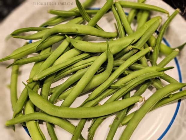 Fresh green beans need their stem ends trimmed before cooking.