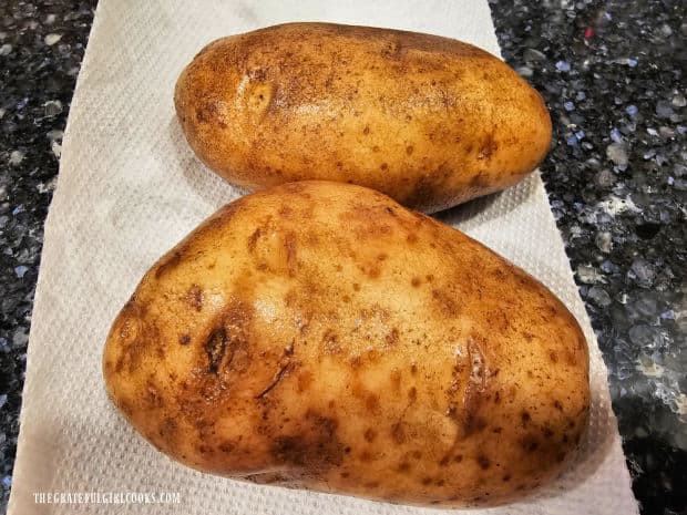 Russet potatoes are washed before they are peeled.