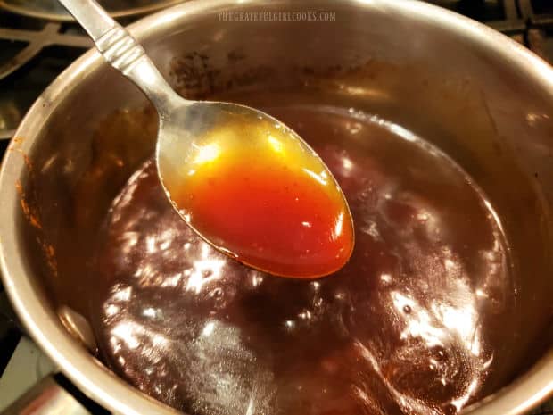 Asian stir fry sauce is thickened and ready to add to the shrimp and broccoli stir-fry.