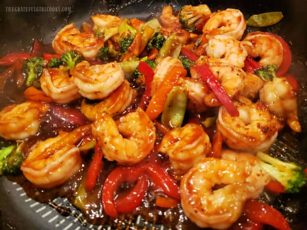 Shrimp and Broccoli Stir-Fry is heated through and then served.