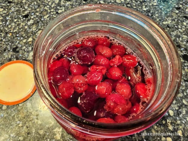 When jar is opened, cranberries are removed, leaving the delicious juice.