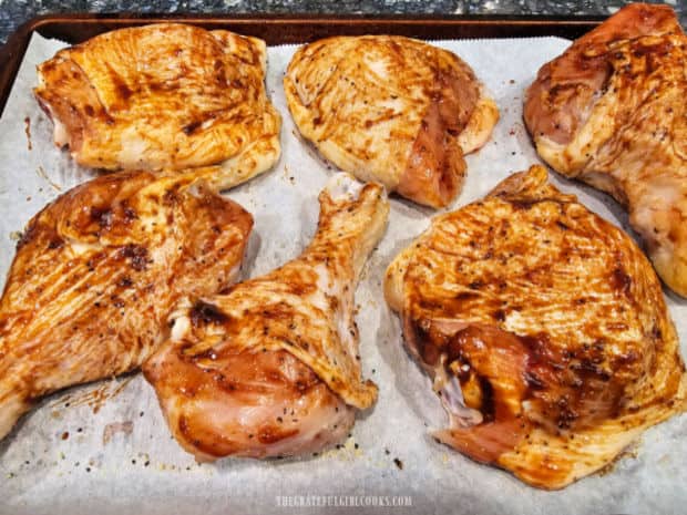 A THIN coating of the BBQ sauce is brushed on all sides of the chicken pieces.