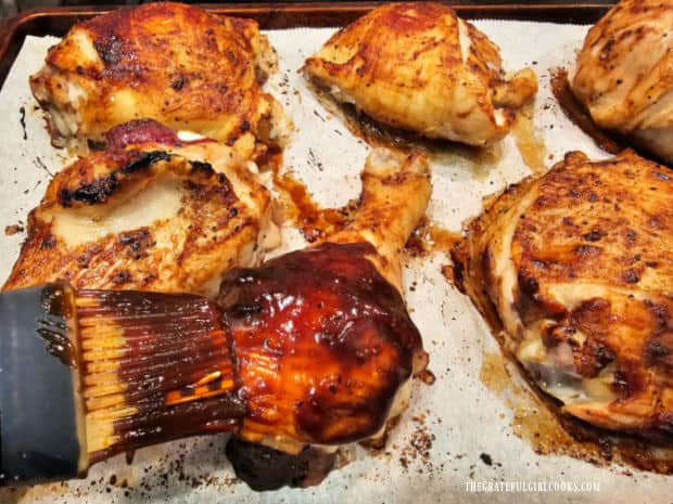 Chicken is baked for 20 minutes, then a THICK coating of Asian BBQ sauce is brushed on.