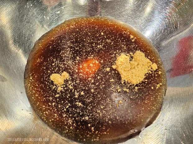 Water, balsamic vinegar, chicken bouillon powder and cornstarch are combined in a small bowl.