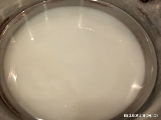 Granulated sugar and water are heated in a medium saucepan.