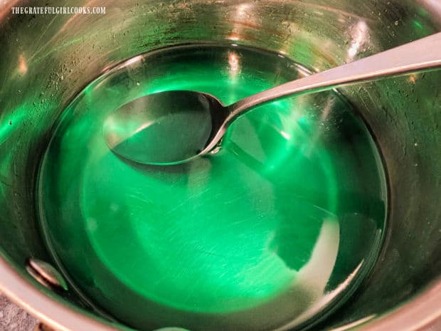 After stirring, the Crème de Menthe liqueur is green in color.