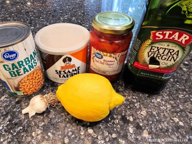 A photo of the ingredients used to make roasted red pepper hummus.