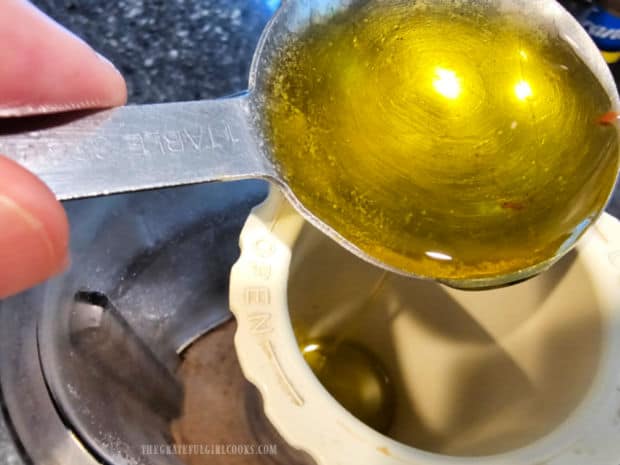 Extra virgin olive oil is added a little at a time and the hummus is processed until smooth and creamy.