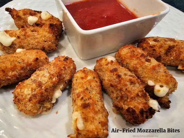 Serve yummy Air-Fried Mozzarella Bites with marinara dipping sauce and watch how fast they disappear! Crisp outside and melted cheese inside!