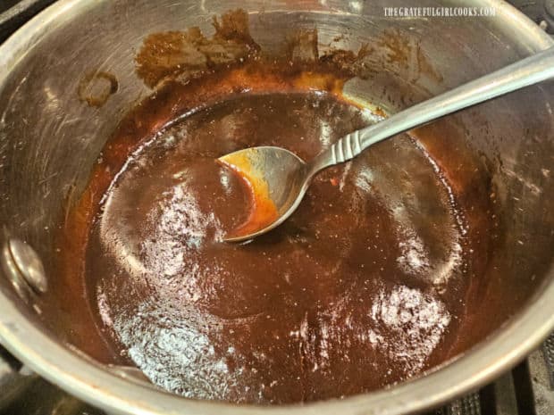 Asian-style BBQ sauce is simmered for 3-4 minutes until the sauce has thickened slightly.