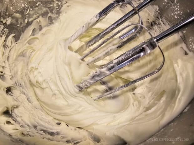 The mint-flavored filling is beaten until thick and creamy with an electric mixer.